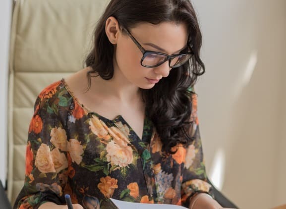 Young woman seeking answers to her money management questions